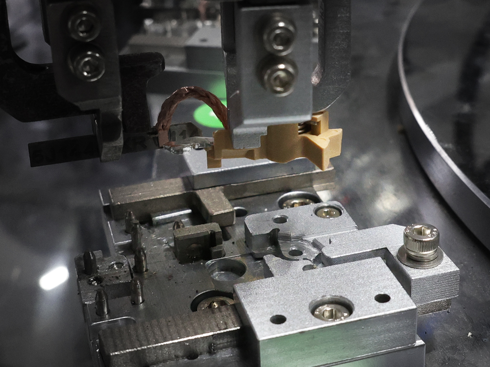 Feeding (Bimetallic Strip Thermal Riveting)